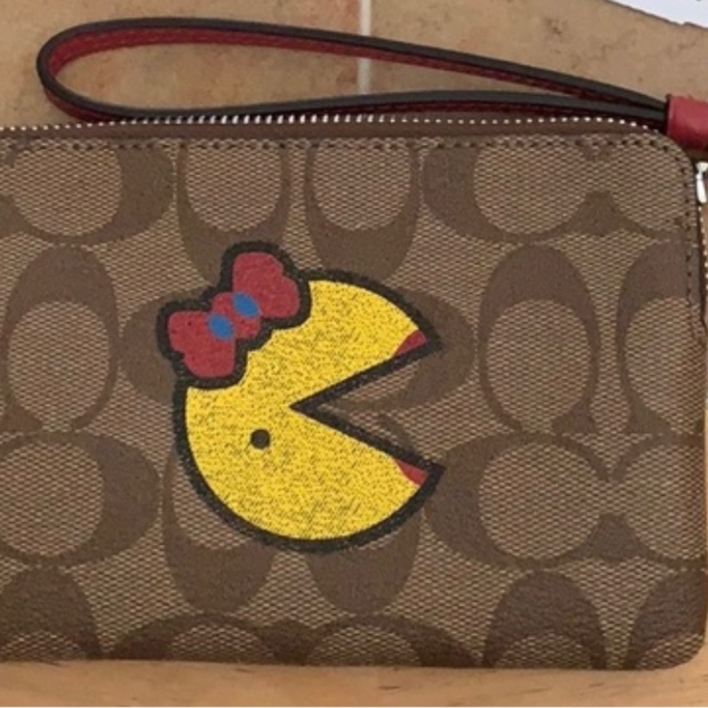 Coach Graphic Ms. Pac-Man Corner Zip Wristlet In Signature Print. - Picture 2 of 5